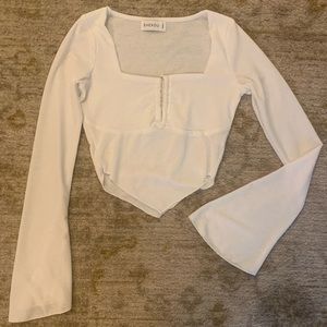 Shekou cropped white bell long sleeve gold detail